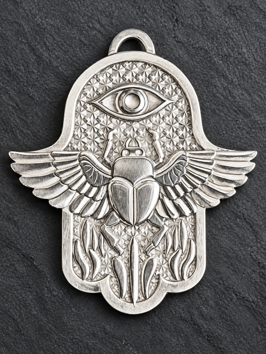 Sterling silver Hamsa Scarab pendant with an evil eye and diamond-textured background